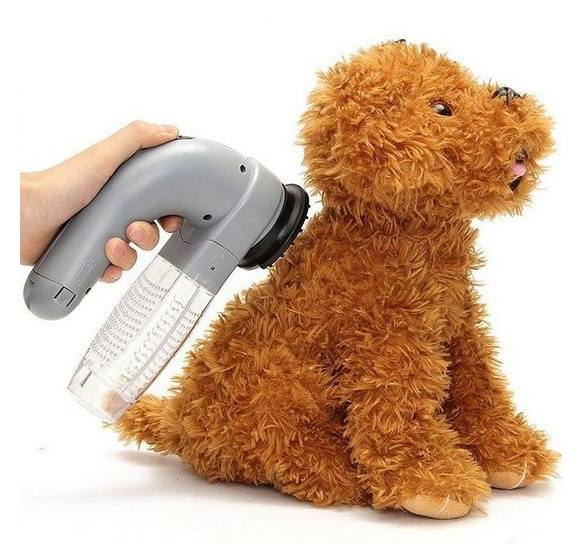 Electric Pet Hair Portable Massage Cleaning Brush with rubber head for gentle grooming and hair removal, designed for pet comfort and safety.