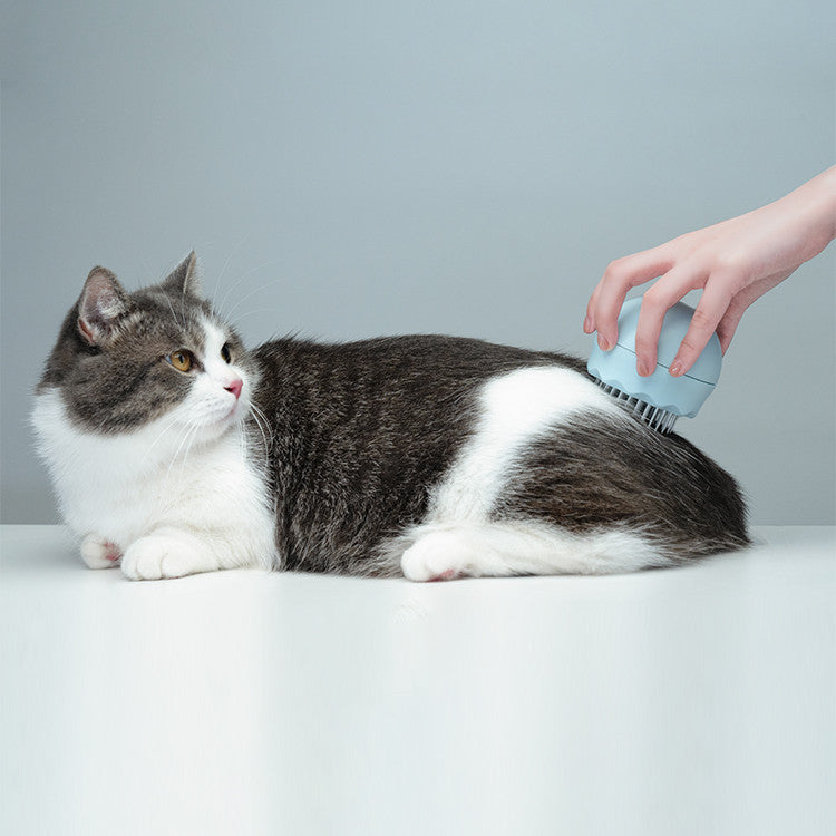 Floating Massage Pet Needle Comb designed for cat grooming, featuring soft silicone bristles for comfort and effective hair removal.