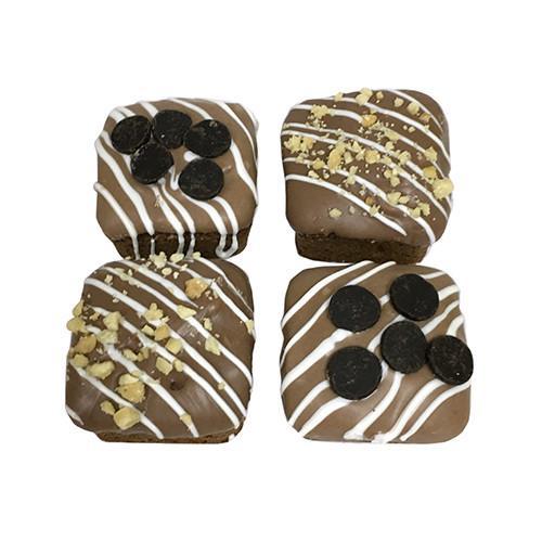 A close-up of Good Dog Brownie Bites, showcasing their chewy texture and rich carob and apple flavor, perfect for dogs.