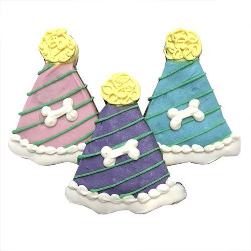 A colorful assortment of party hats for pets, made from peanut butter recipe, displayed in a case of 12.