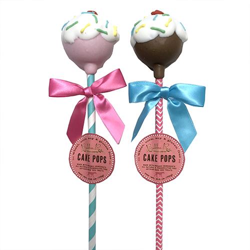 Sundae Cake Pops for dogs, featuring a peanut butter apple cake ball on a straw, beautifully displayed.