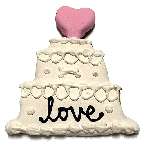 A beautifully decorated wedding cake favor, customizable with names and dates, made with natural ingredients and topped with yogurt coating.