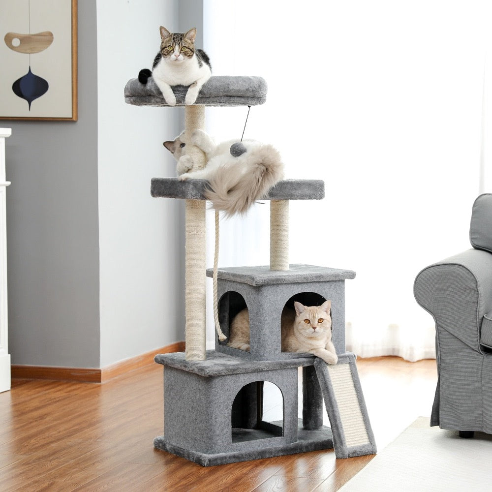 A multi-level Cat Tree Entertainment Tower with stairs, featuring cozy houses, scratching posts, a swinging ball, and sisal rope, designed for playful cats.