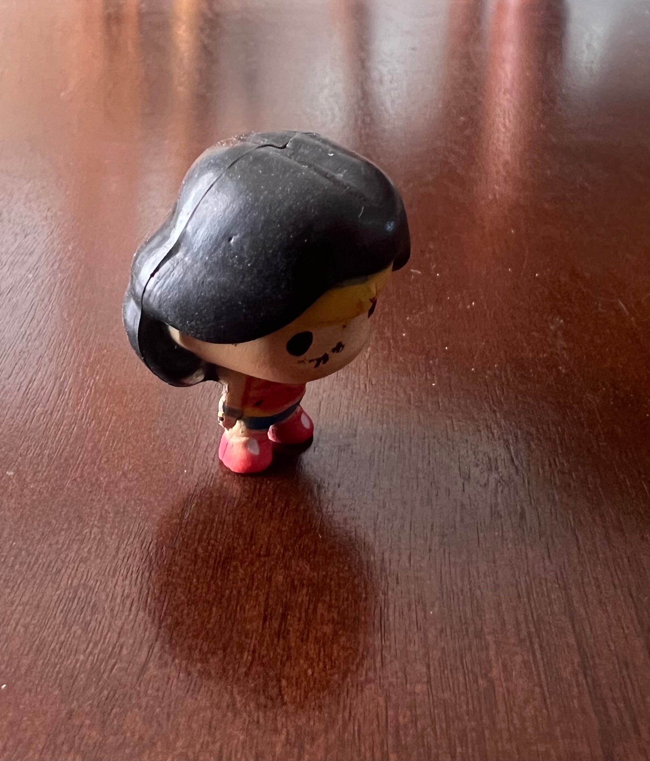 DC Comics Chibi Wonder Woman minifigure bobblehead, 1.5 inches tall, featuring vibrant colors and a cute design.