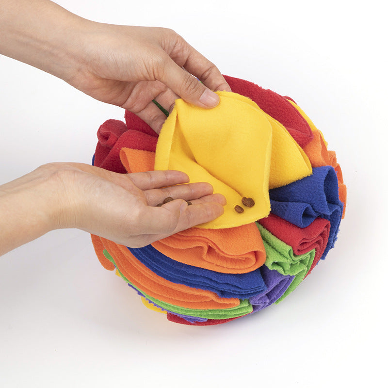 A colorful Dog Sniffing Training Blanket Snuffle Ball Mat made of soft polar fleece, featuring multiple folds and pockets for hiding treats, designed for engaging dogs in foraging activities.