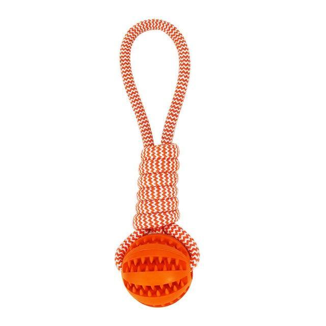 Durable rubber ball chew toy with cotton rope, designed for dogs, featuring a soft texture and vibrant colors for safe chewing and interactive play.