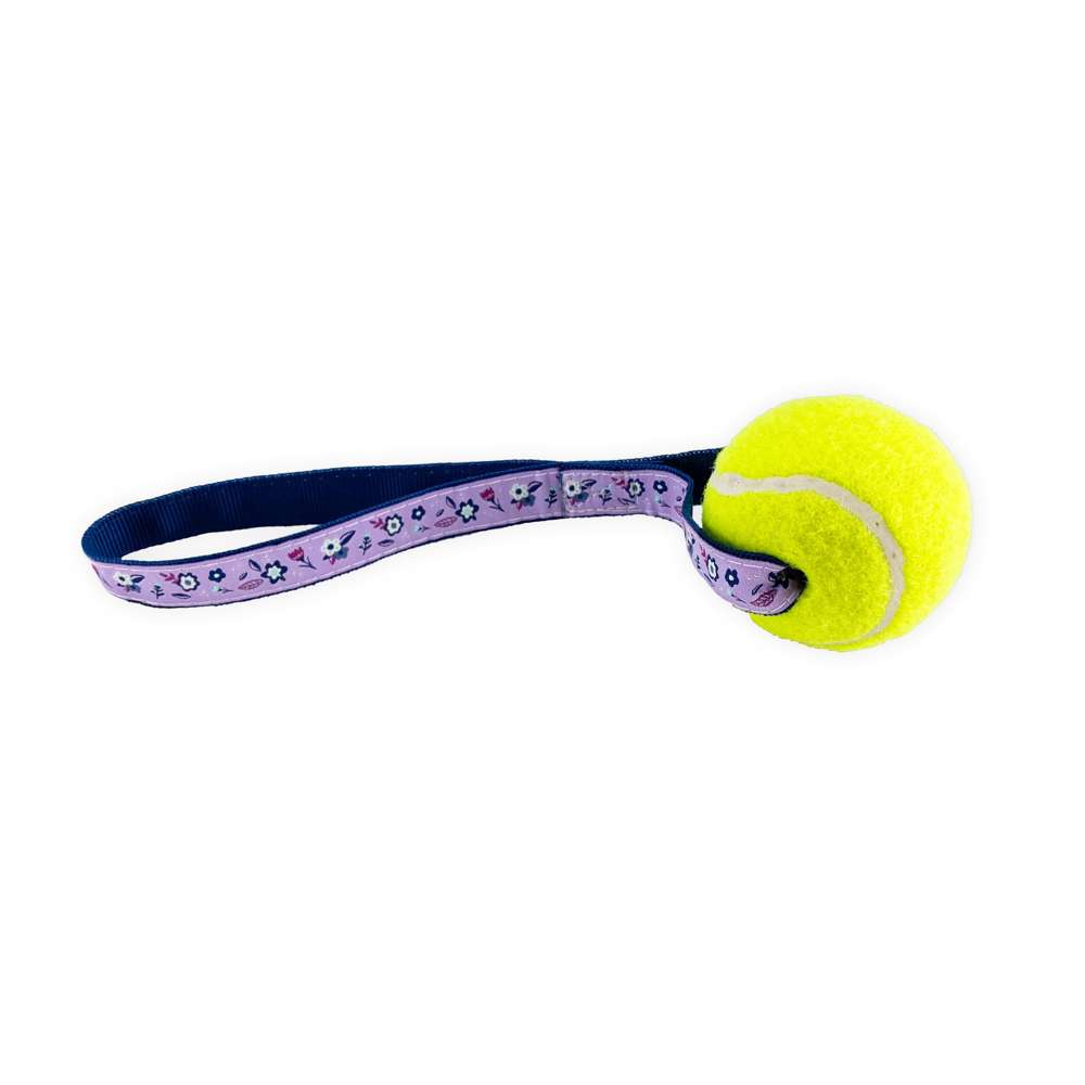 Metro Floral Tennis Ball Toss Toy featuring a durable nylon loop handle and a non-pressurized Tuff Ball, designed for safe and clean play.