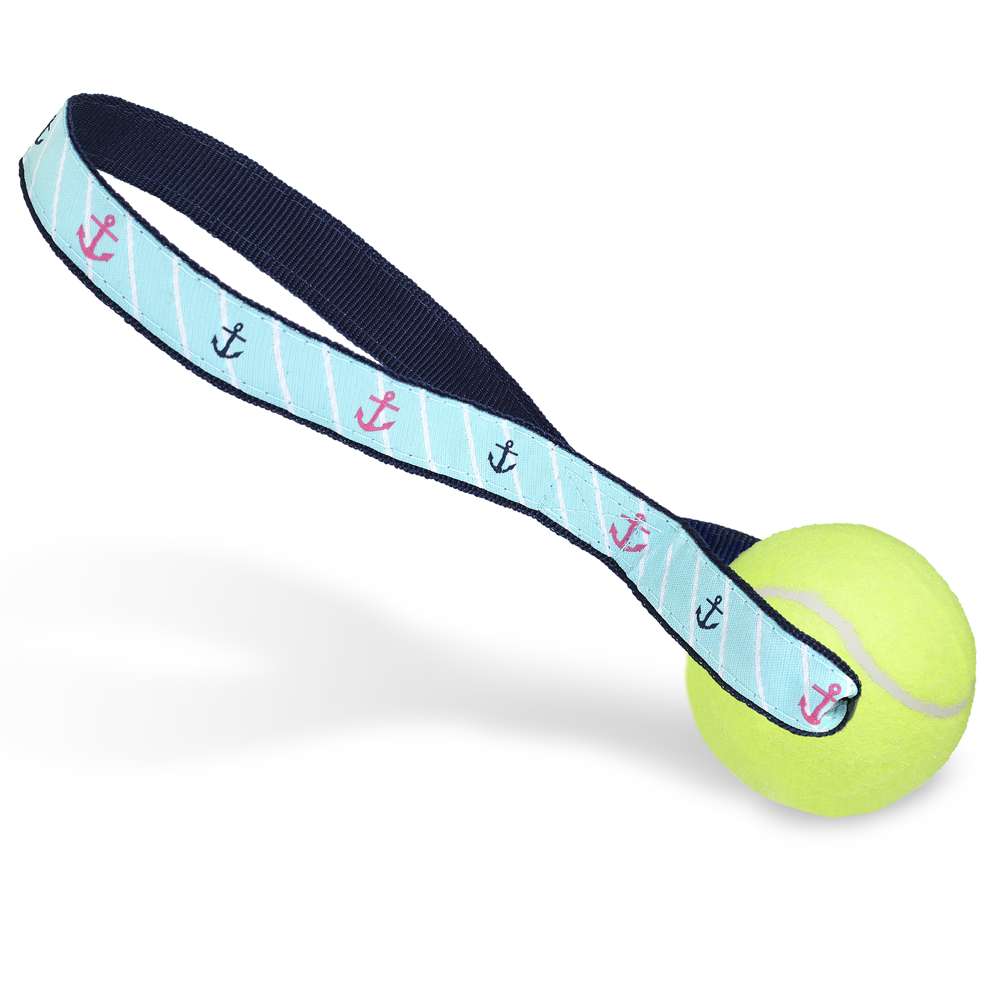 A vibrant pink anchor-shaped tennis ball toss toy with a durable nylon loop handle, designed for interactive play with dogs.