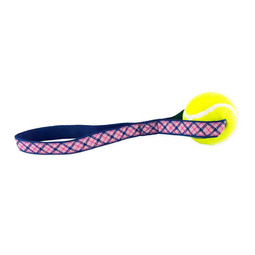 A colorful Preppy Plaid Tennis Ball Toss Toy featuring a durable nylon loop handle and a non-pressurized Tuff Ball, perfect for dogs.