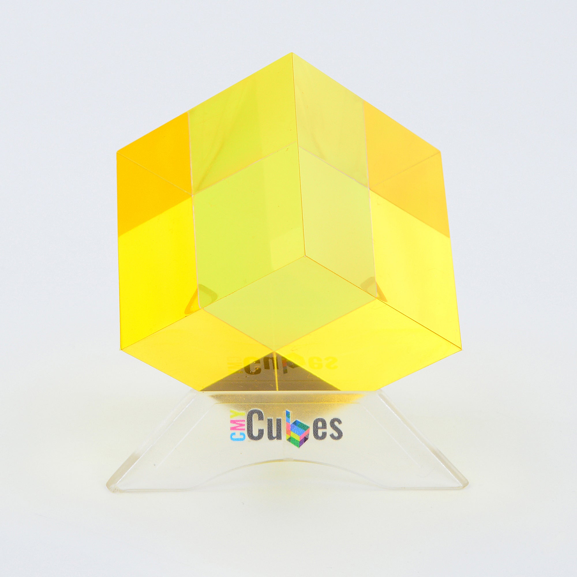 The Cube Stand displaying a vibrant Mini Cube, featuring a clear and stylish design that enhances the cube's colors.