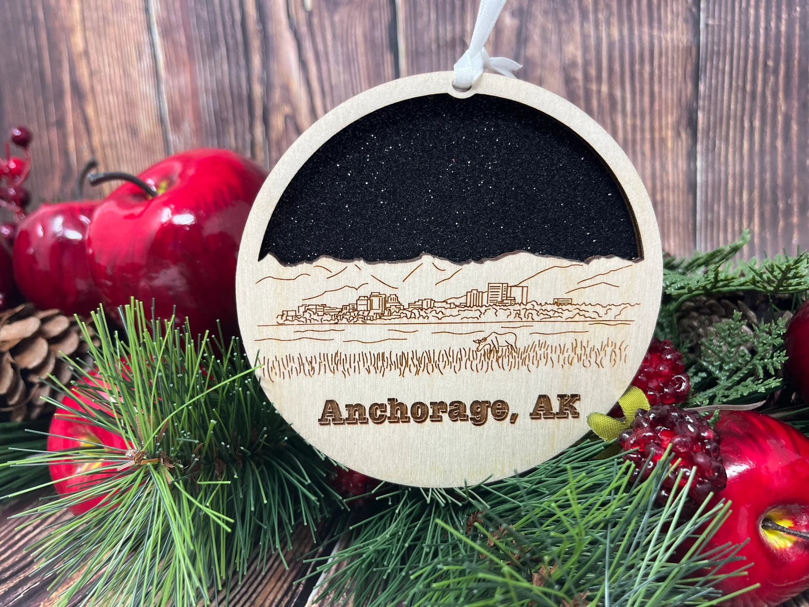 Anchorage Skyline Ornament made from premium Baltic birch wood, showcasing the city's skyline design, perfect for holiday decorations.