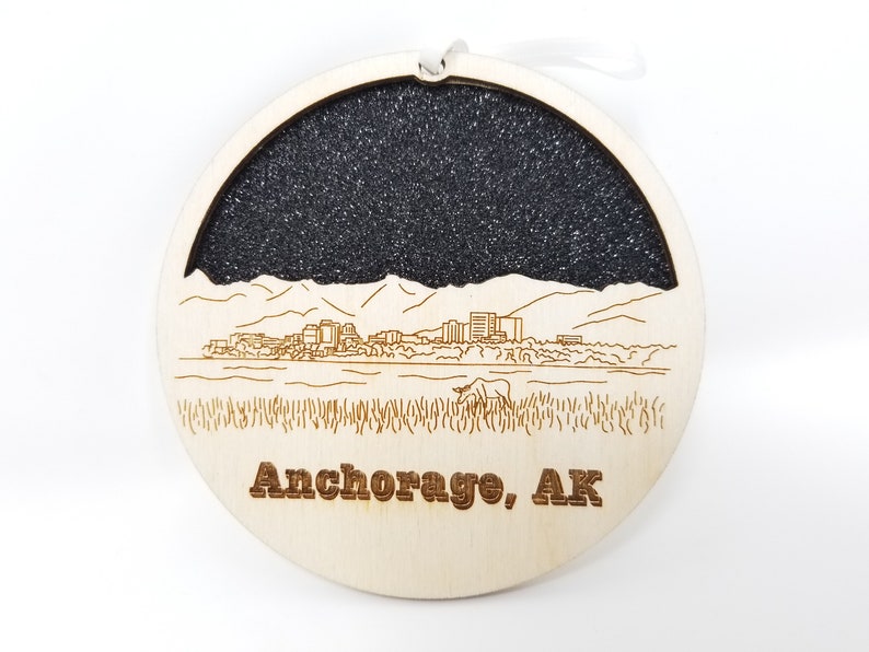 Anchorage Skyline Ornament made from premium Baltic birch wood, showcasing the city's skyline design, perfect for holiday decorations.