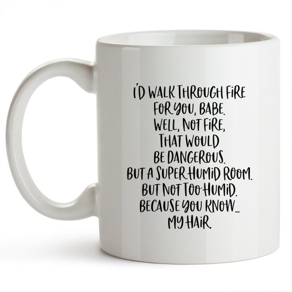 White mug with humorous text.