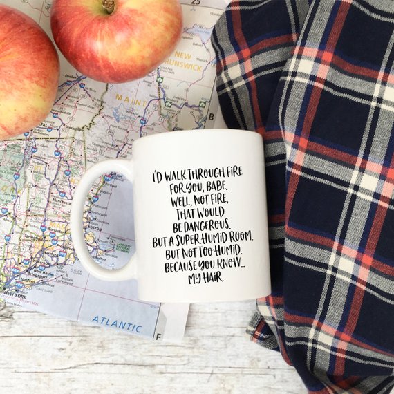 Coffee mug with humorous text.