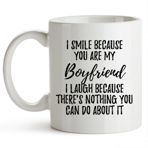 A pair of elegant white ceramic mugs featuring vibrant designs on both sides, perfect for anniversary gifts for boyfriends, showcasing their high-quality craftsmanship.