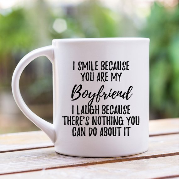 A pair of elegant white ceramic mugs featuring vibrant designs on both sides, perfect for anniversary gifts for boyfriends, showcasing their high-quality craftsmanship.