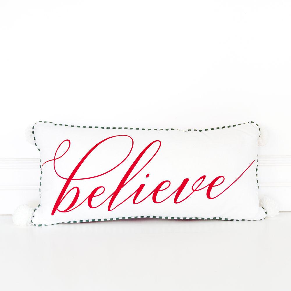 Believe pillow from Gia Roma's Premium Holiday Collection featuring red script and plaid design, adorned with tassel balls.