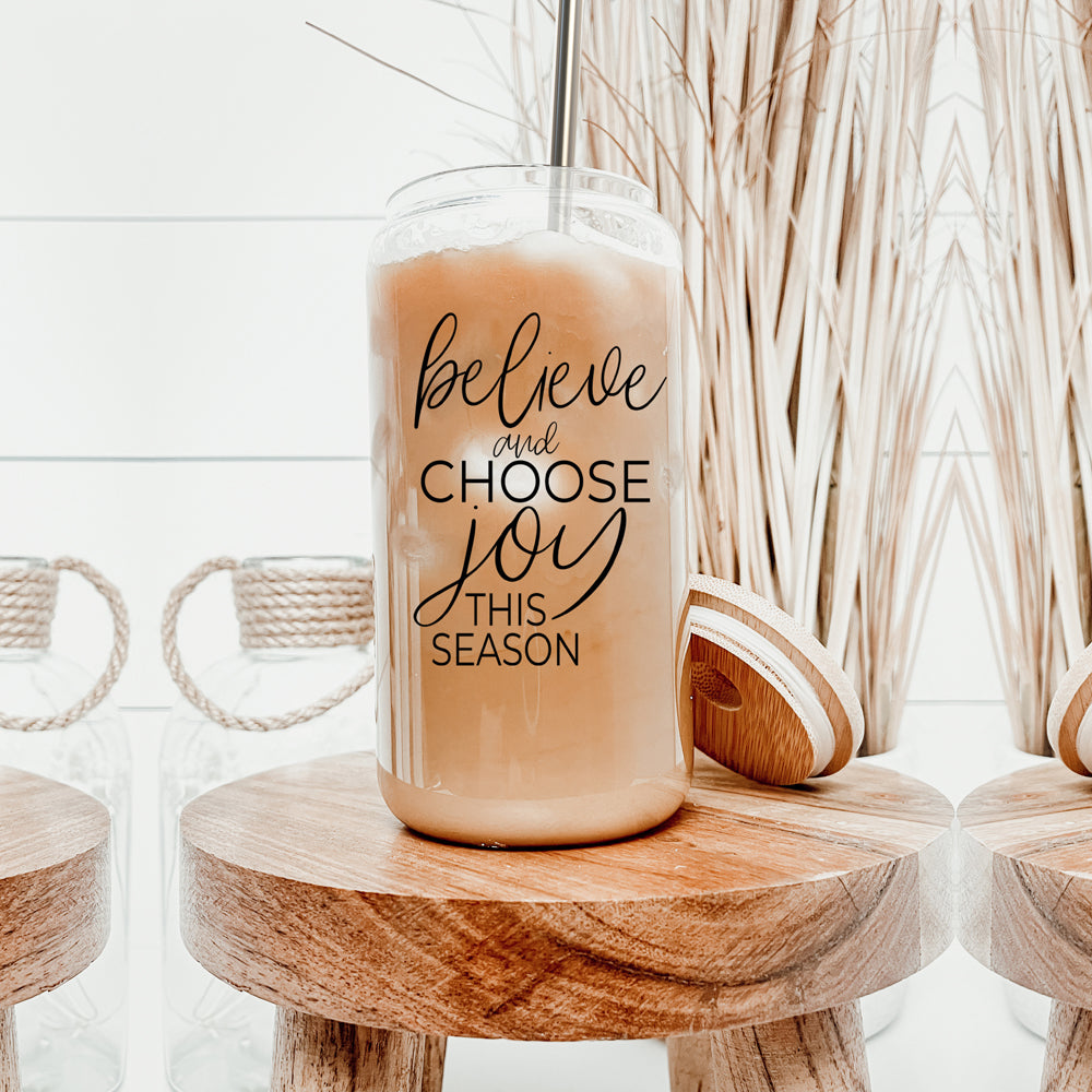 Believe & Joy Cup set featuring high borosilicate glass, bamboo lid, and stainless steel straws, perfect for various beverages.