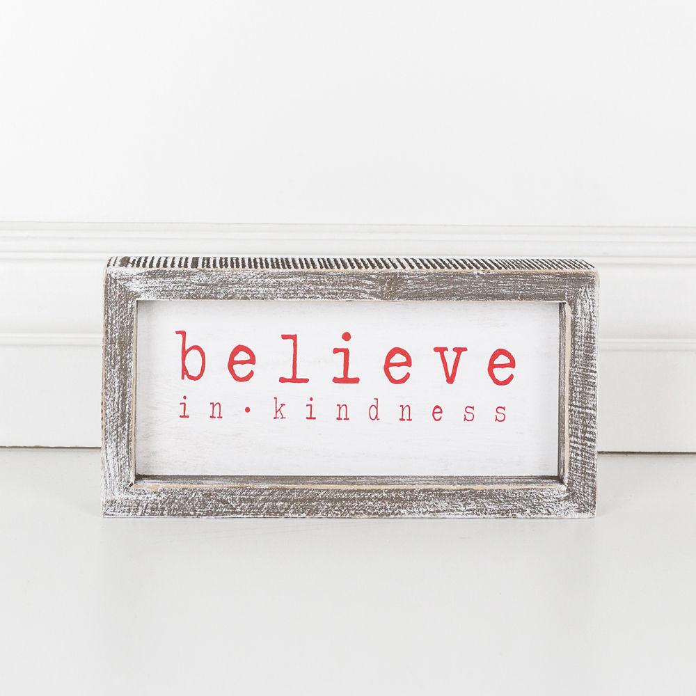 A wood framed Believe Sign featuring the phrase 'Believe In Kindness' in festive white and red colors, perfect for Christmas decor.