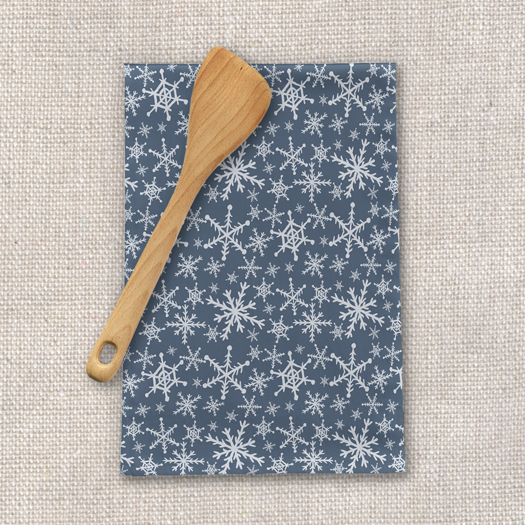 Blue Snowflakes Tea Towel made of cotton twill, featuring a charming snowflake design, measuring 18x30 inches, perfect for kitchen use.