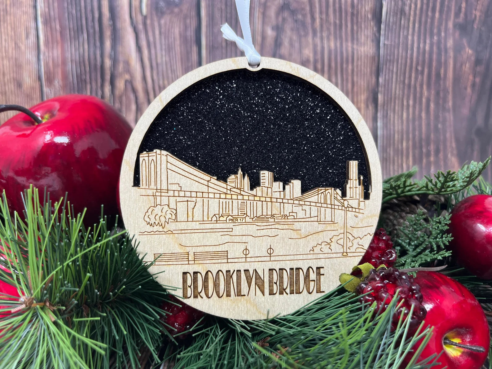 Brooklyn Bridge Pier 17 Skyline Ornament made from premium Baltic birch wood, showcasing intricate skyline design.