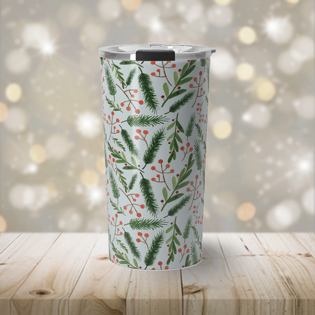 A stylish Christmas Branch Travel Coffee Mug made of stainless steel with festive artwork, perfect for hot and cold beverages.