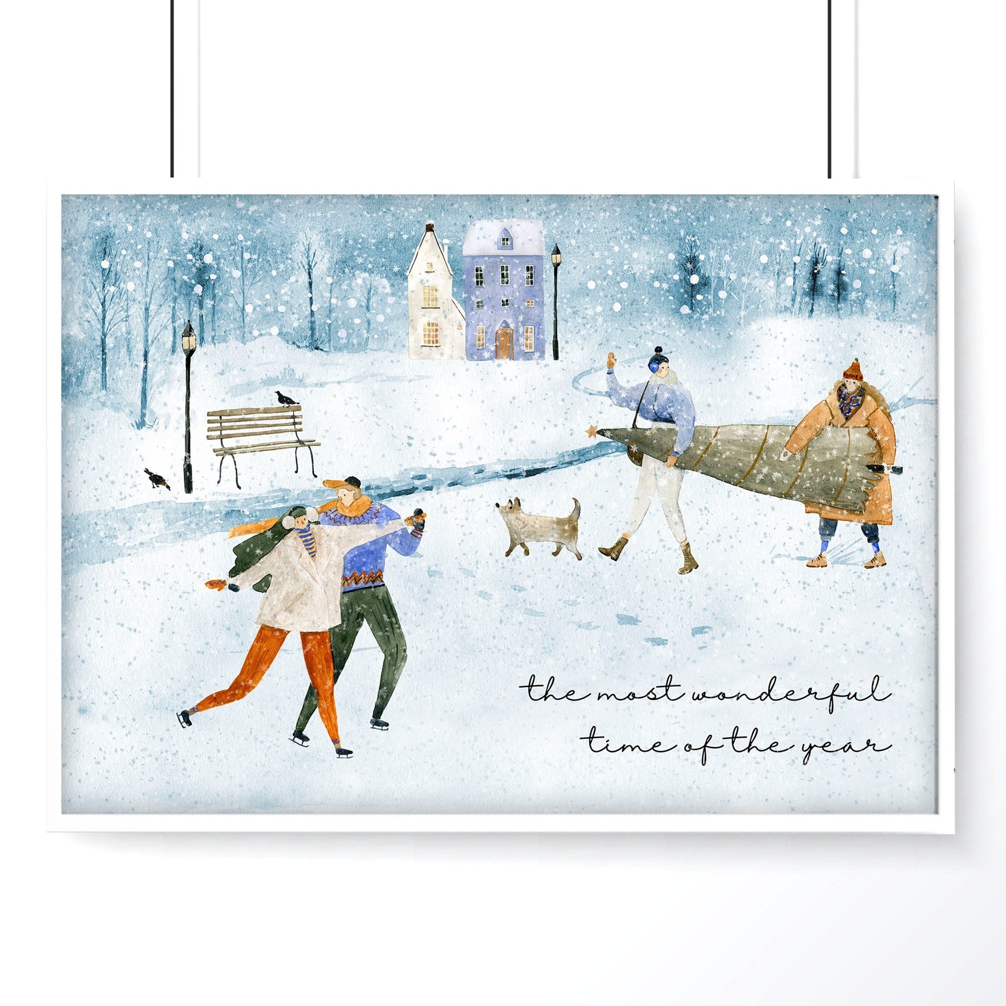 A beautiful Christmas decor wall art print featuring a snowy village scene with joyful skaters and a Christmas tree in soothing bluish tones.