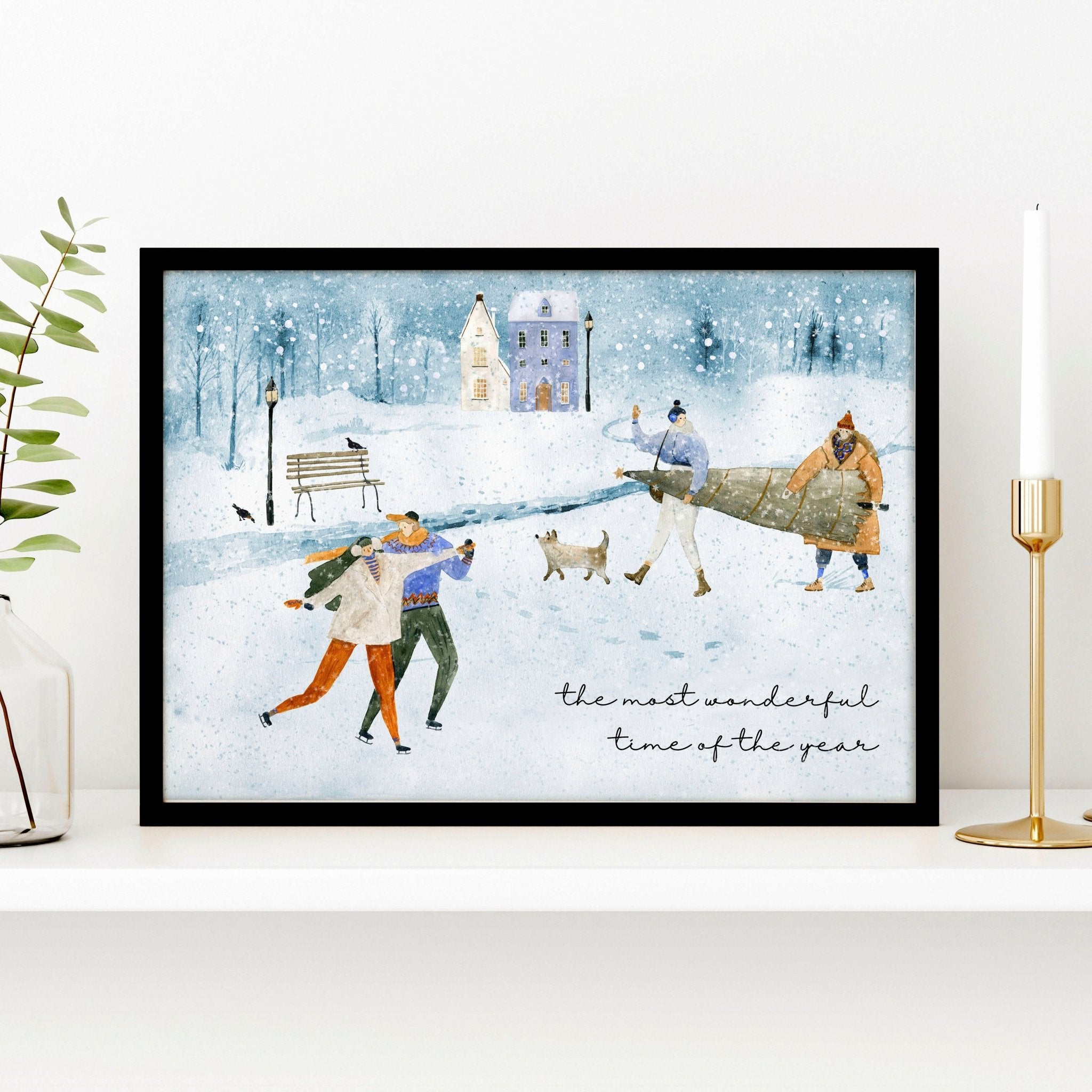 A beautiful Christmas decor wall art print featuring a snowy village scene with joyful skaters and a Christmas tree in soothing bluish tones.