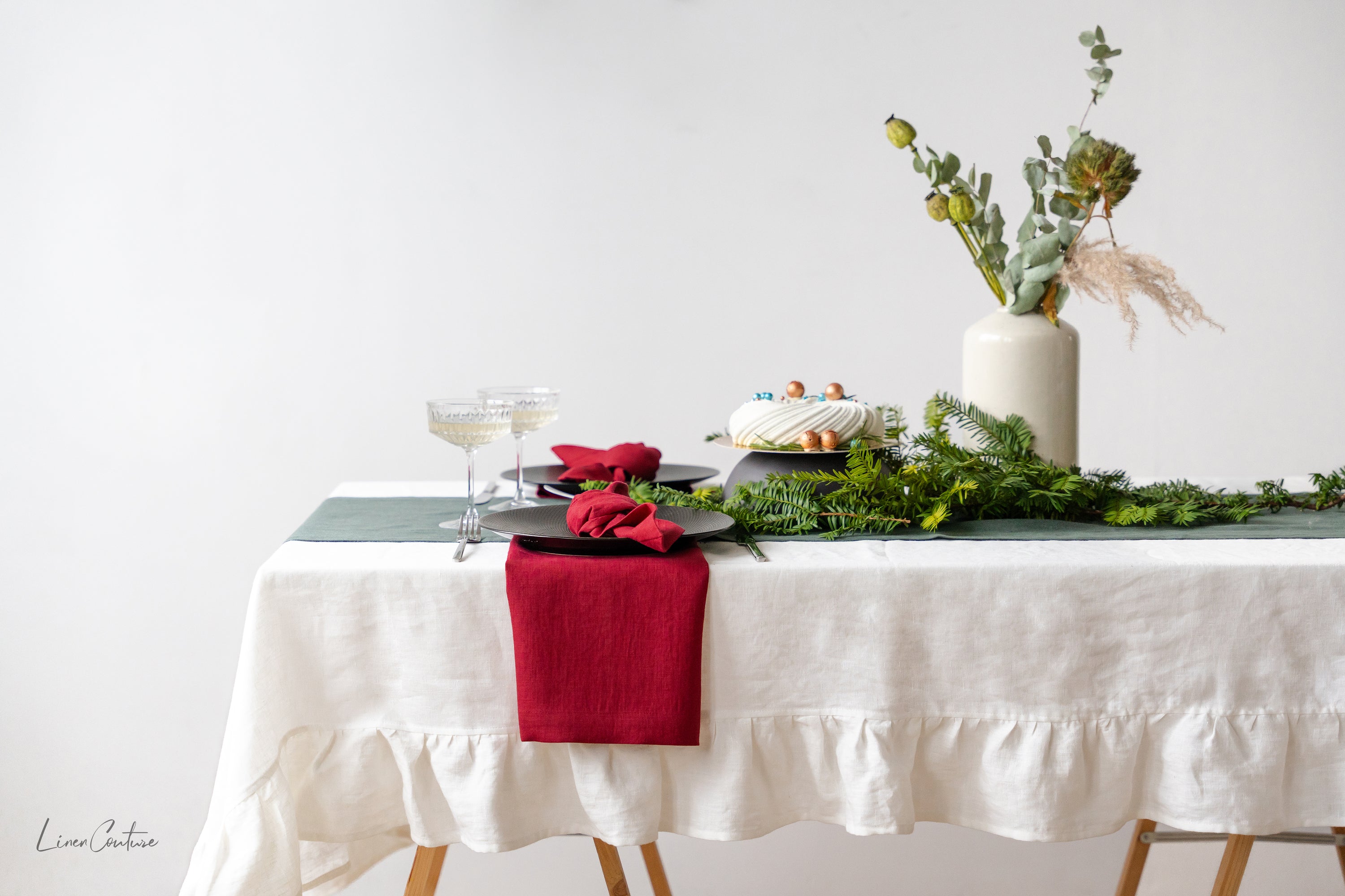 Christmas Greyish Green Dining Table Runner made from 100% European linen, featuring a minimalist design and decorative hem.