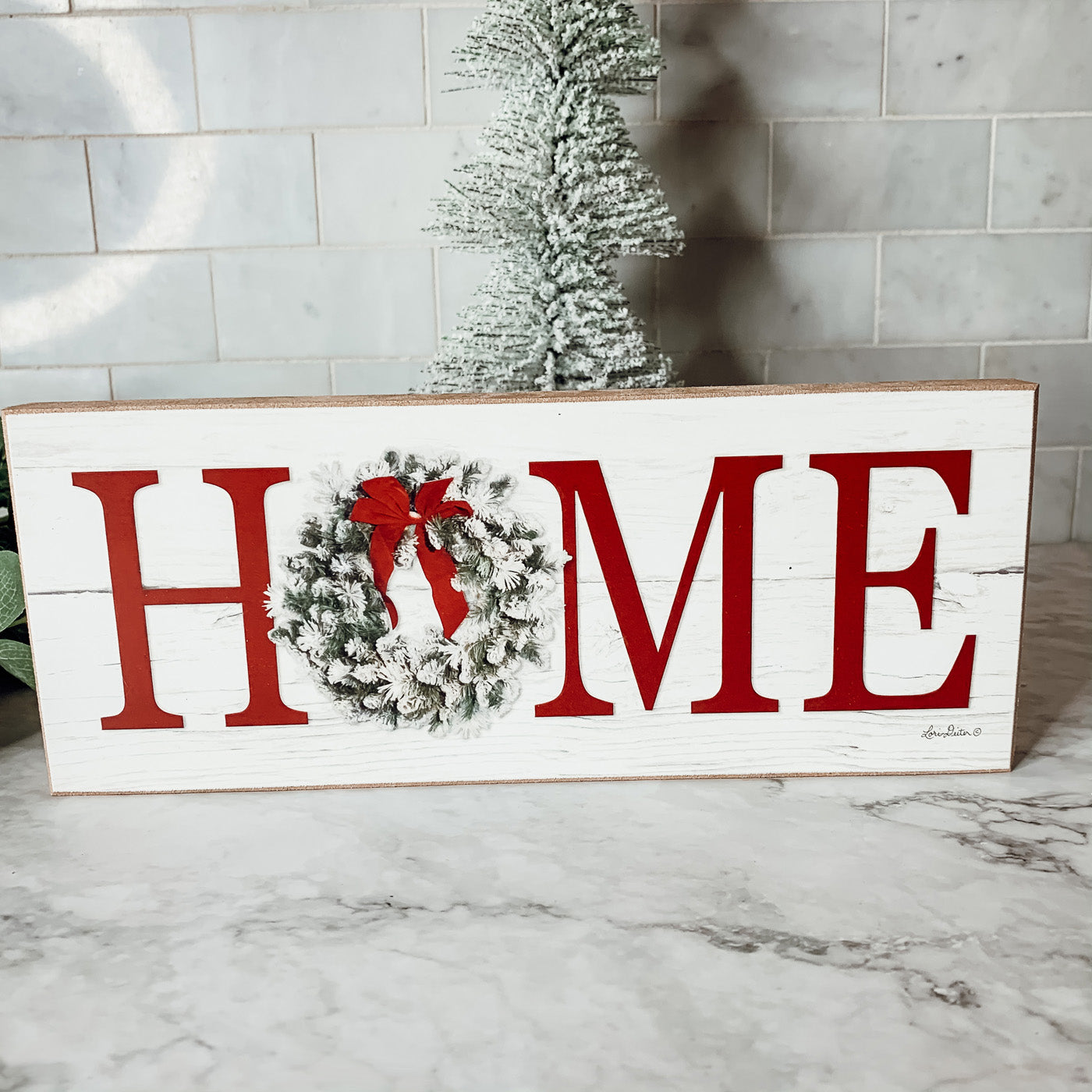 Handmade wooden Christmas Home sign with a festive wreath on the letter 'O', perfect for holiday decor.