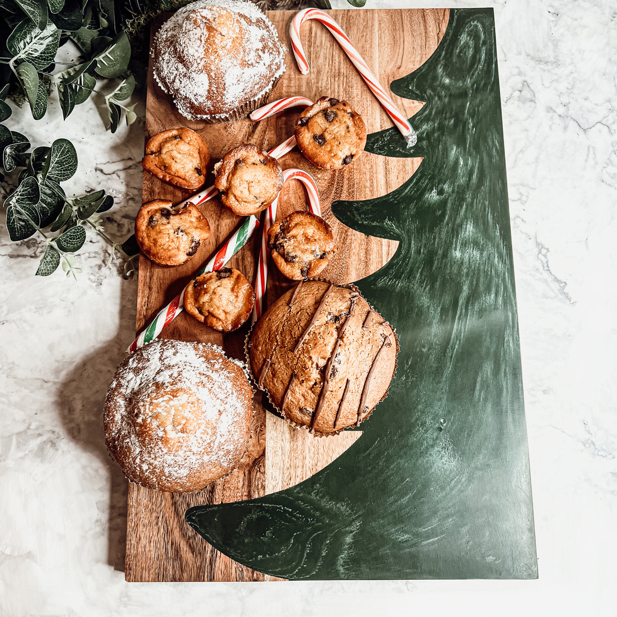 Hand-crafted Christmas Serving Board with marbled tree inlay, made from Acacia wood and resin, perfect for holiday gatherings.