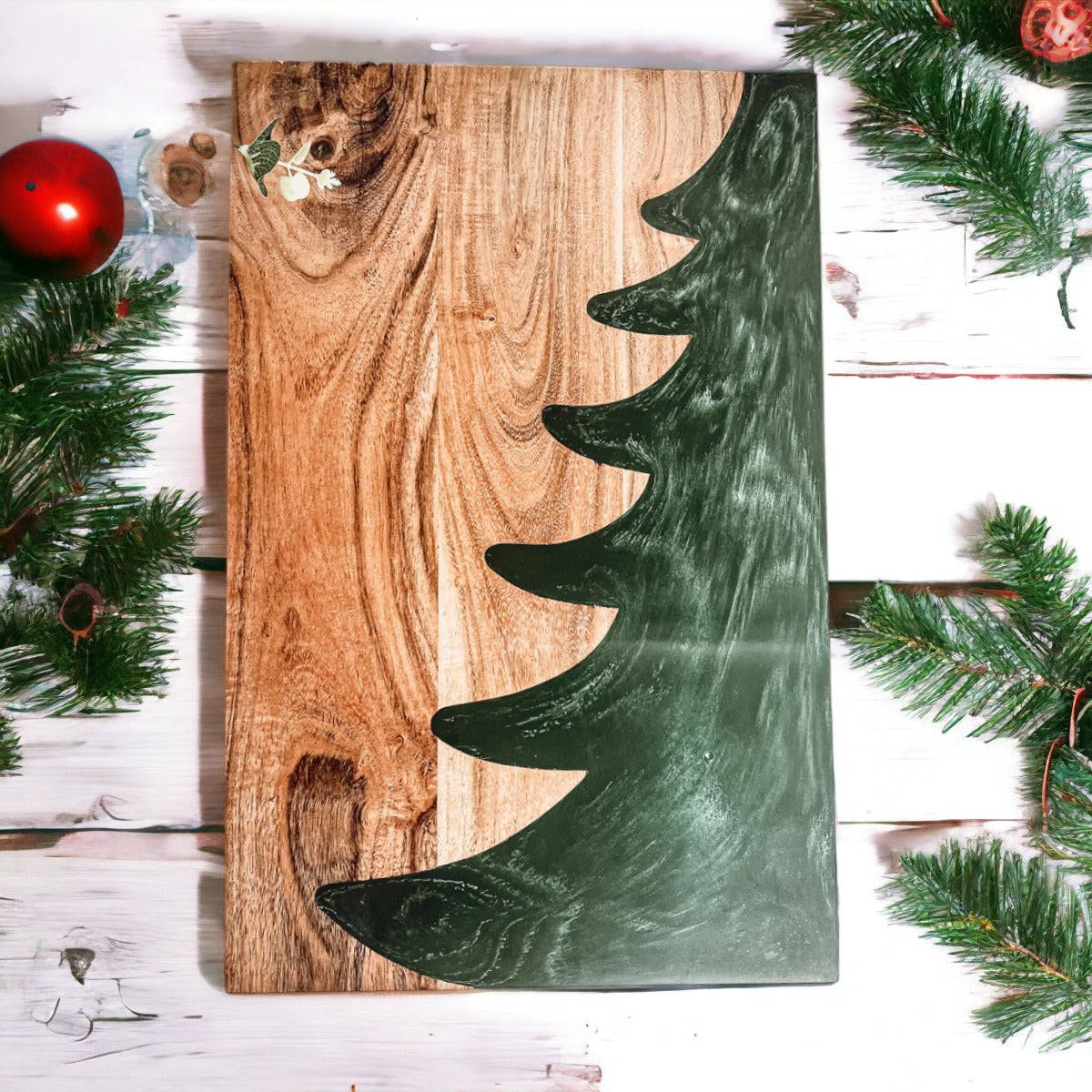 Hand-crafted Christmas Serving Board with marbled tree inlay, made from Acacia wood and resin, perfect for holiday gatherings.