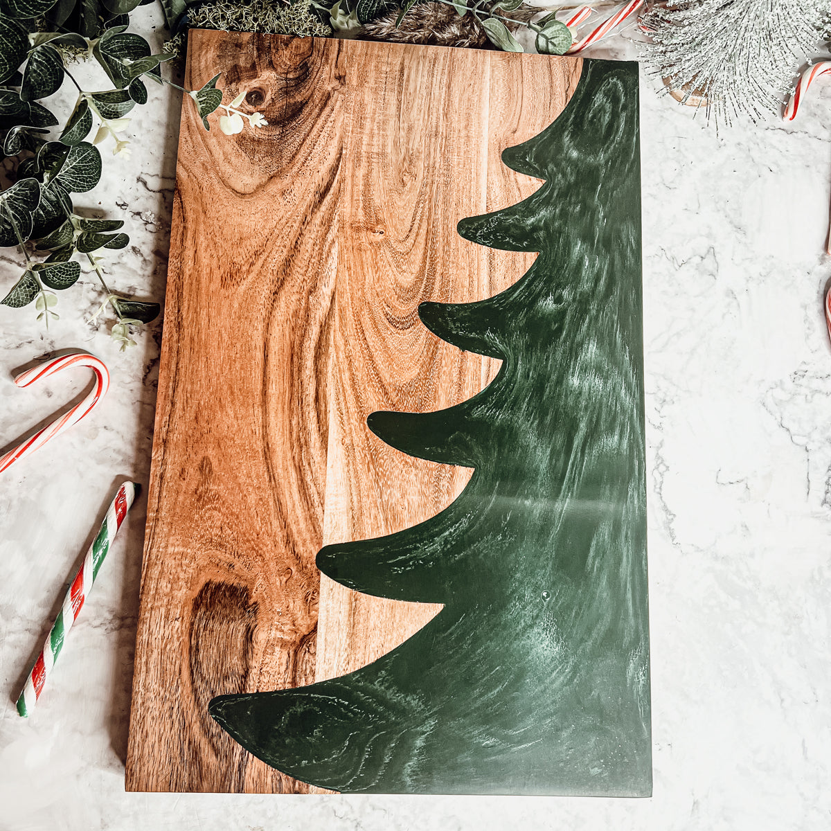 Hand-crafted Christmas Serving Board with marbled tree inlay, made from Acacia wood and resin, perfect for holiday gatherings.