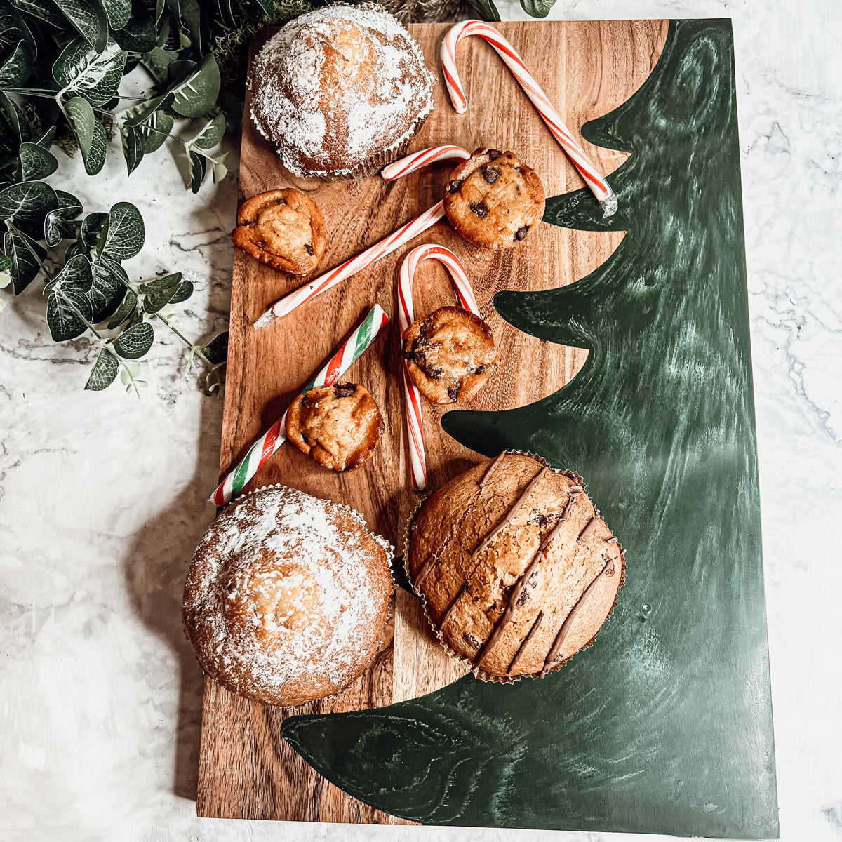 Hand-crafted Christmas Serving Board with marbled tree inlay, made from Acacia wood and resin, perfect for holiday gatherings.