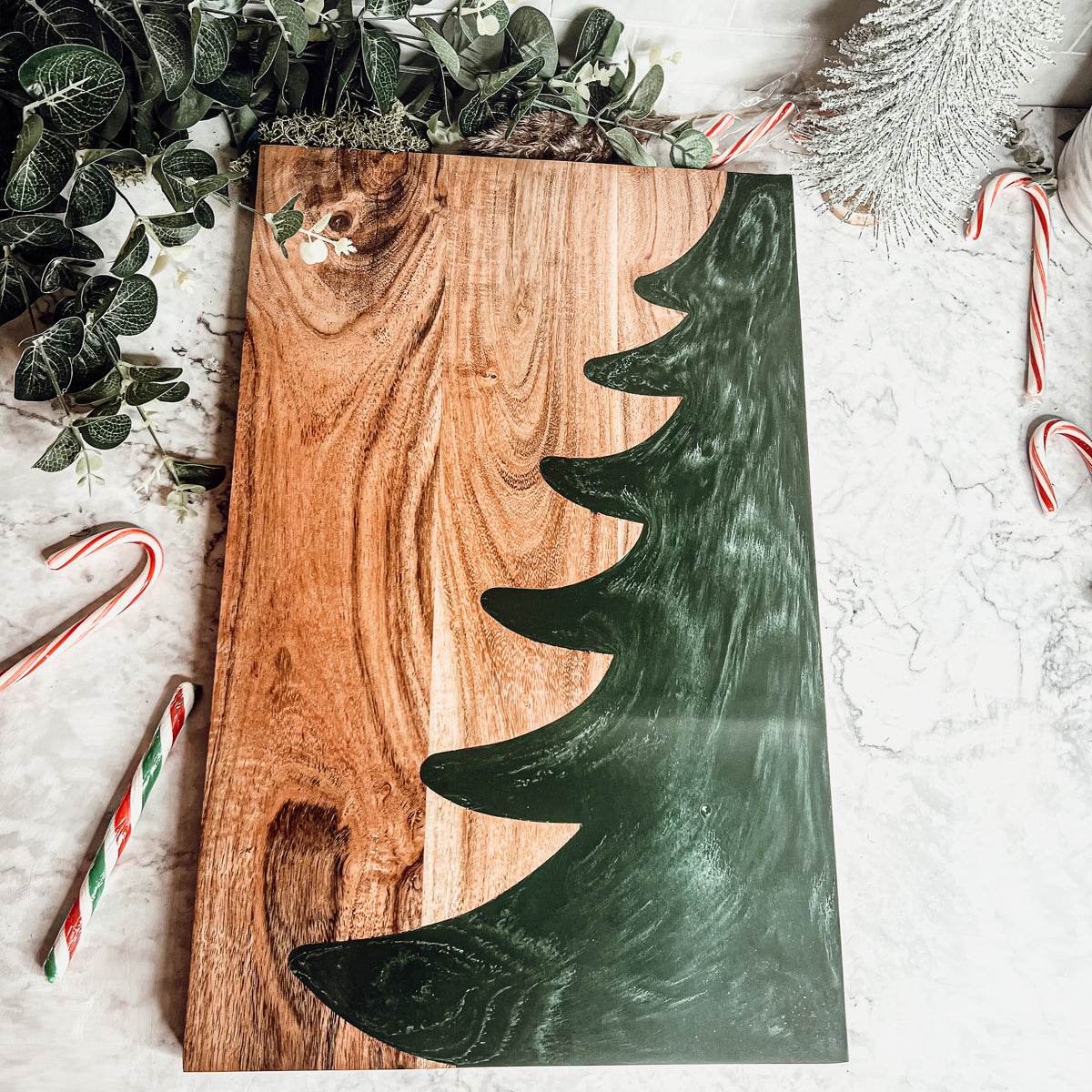 Hand-crafted Christmas Serving Board with marbled tree inlay, made from Acacia wood and resin, perfect for holiday gatherings.