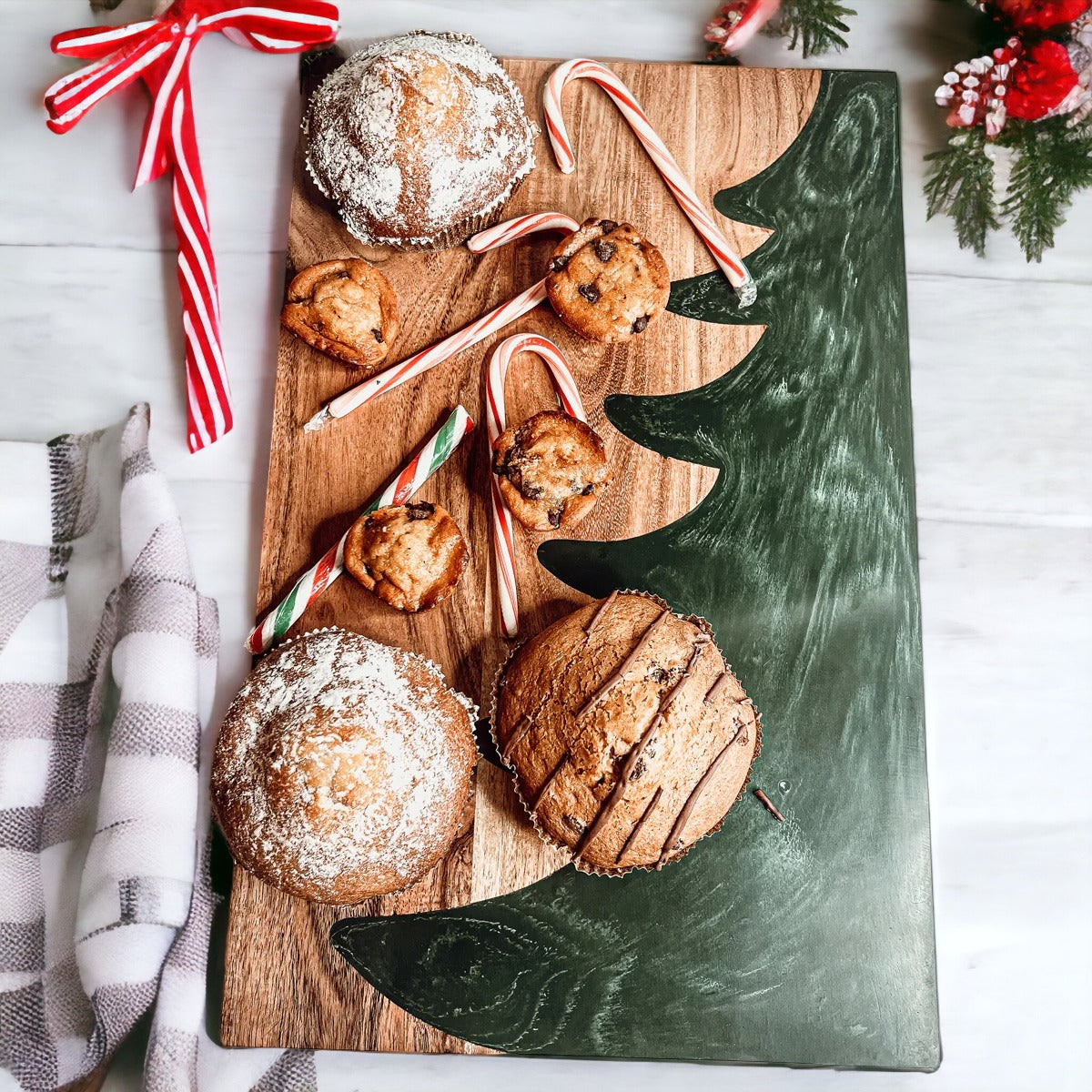 Hand-crafted Christmas Serving Board with marbled tree inlay, made from Acacia wood and resin, perfect for holiday gatherings.