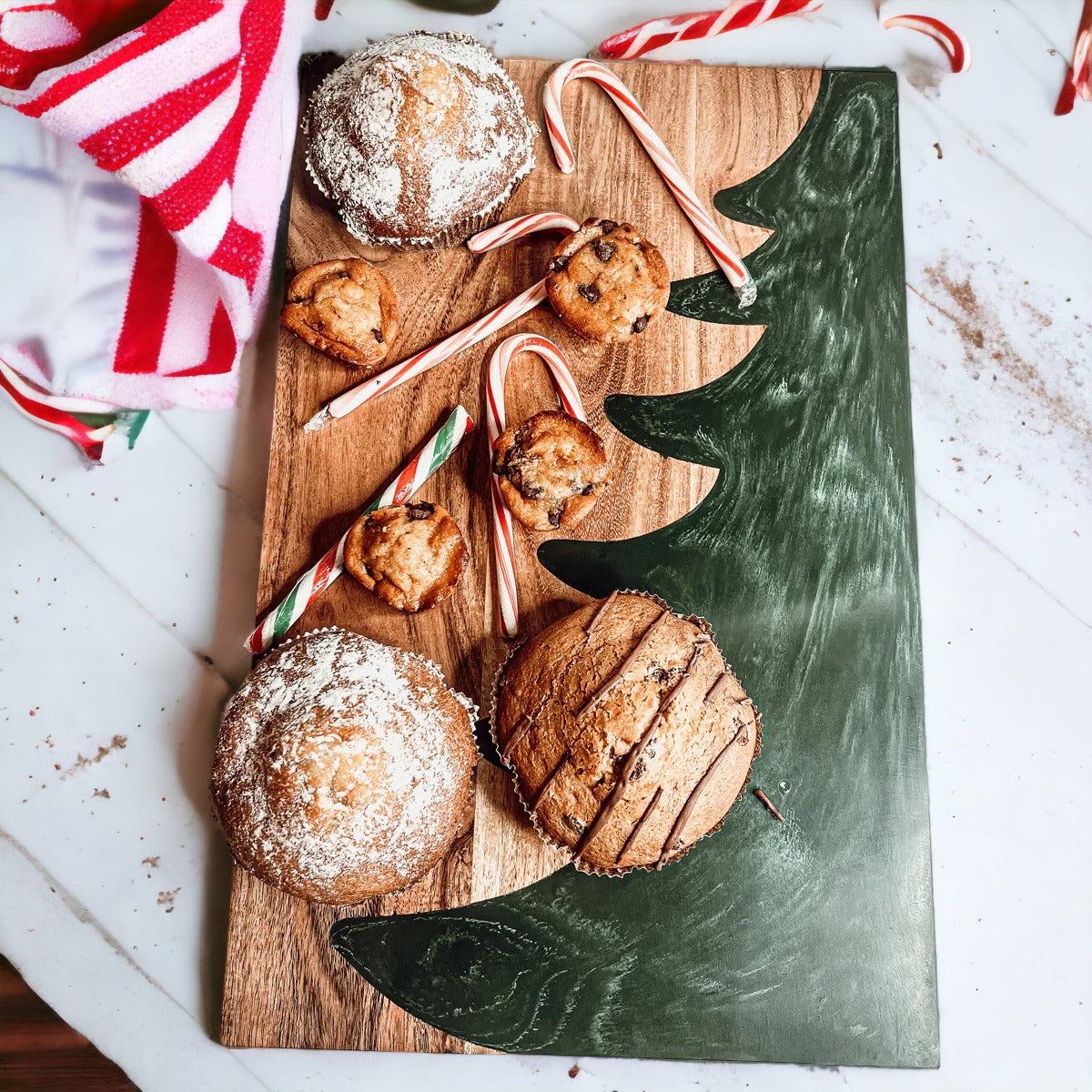 Hand-crafted Christmas Serving Board with marbled tree inlay, made from Acacia wood and resin, perfect for holiday gatherings.