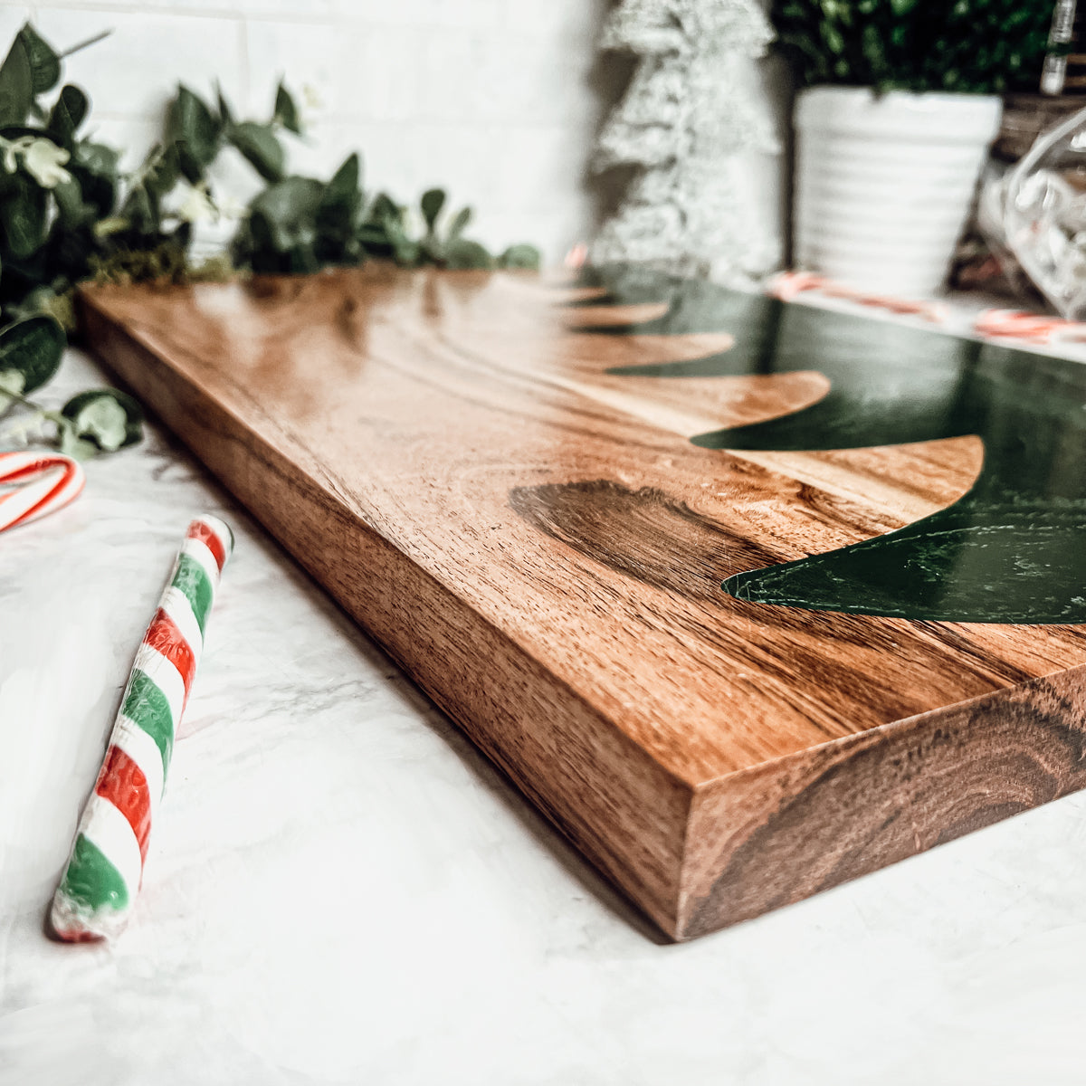 Hand-crafted Christmas Serving Board with marbled tree inlay, made from Acacia wood and resin, perfect for holiday gatherings.