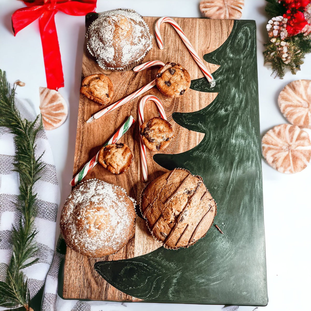 Hand-crafted Christmas Serving Board with marbled tree inlay, made from Acacia wood and resin, perfect for holiday gatherings.