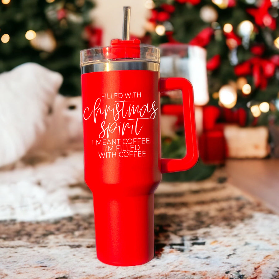 A vibrant red insulated mug with a humorous holiday quote, featuring a matte finish and a versatile 3-in-1 lid.