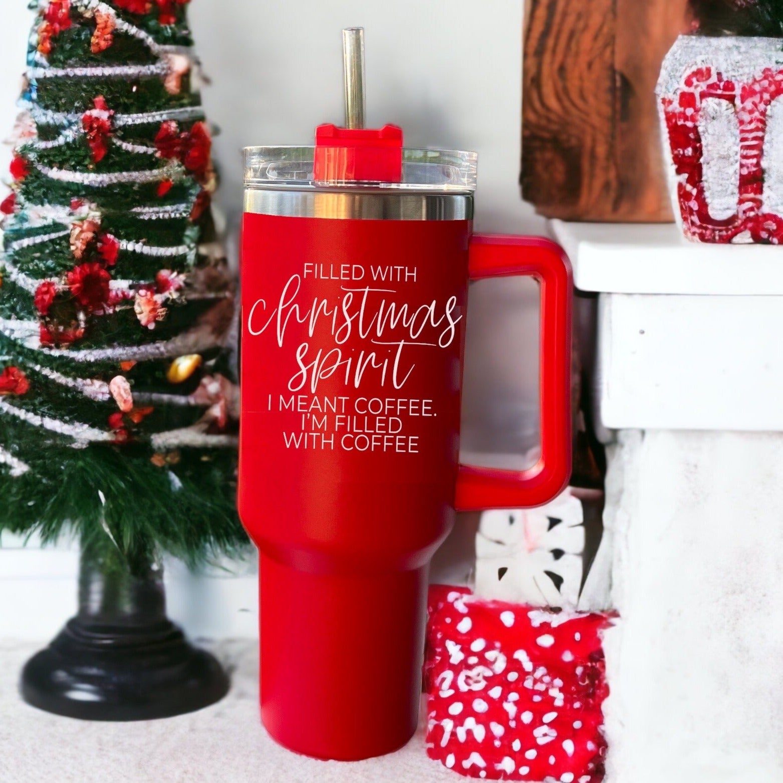 A vibrant red insulated mug with a humorous holiday quote, featuring a matte finish and a versatile 3-in-1 lid.