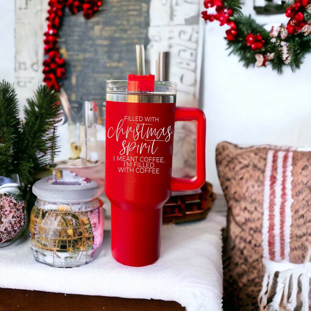 A vibrant red insulated mug with a humorous holiday quote, featuring a matte finish and a versatile 3-in-1 lid.