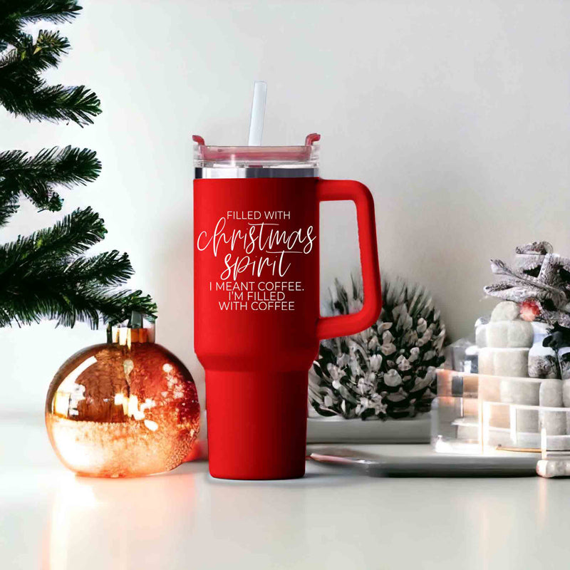 A vibrant red insulated mug with a humorous holiday quote, featuring a matte finish and a versatile 3-in-1 lid.