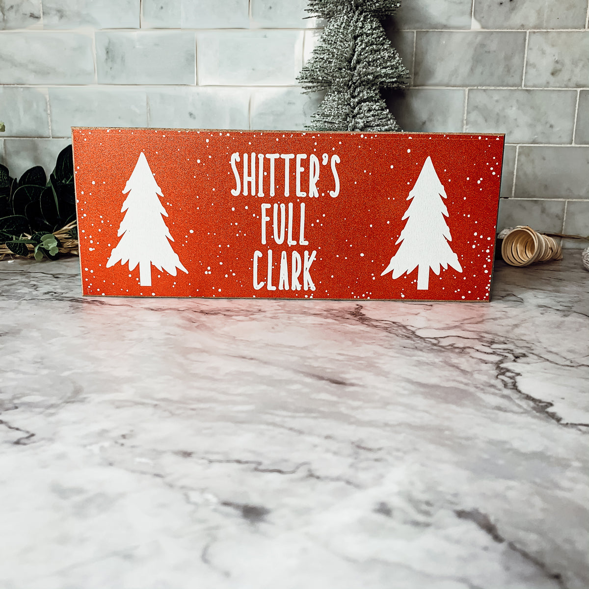 Handmade Clark Sign made of thick wood, featuring a funny Christmas design, perfect for holiday decor.