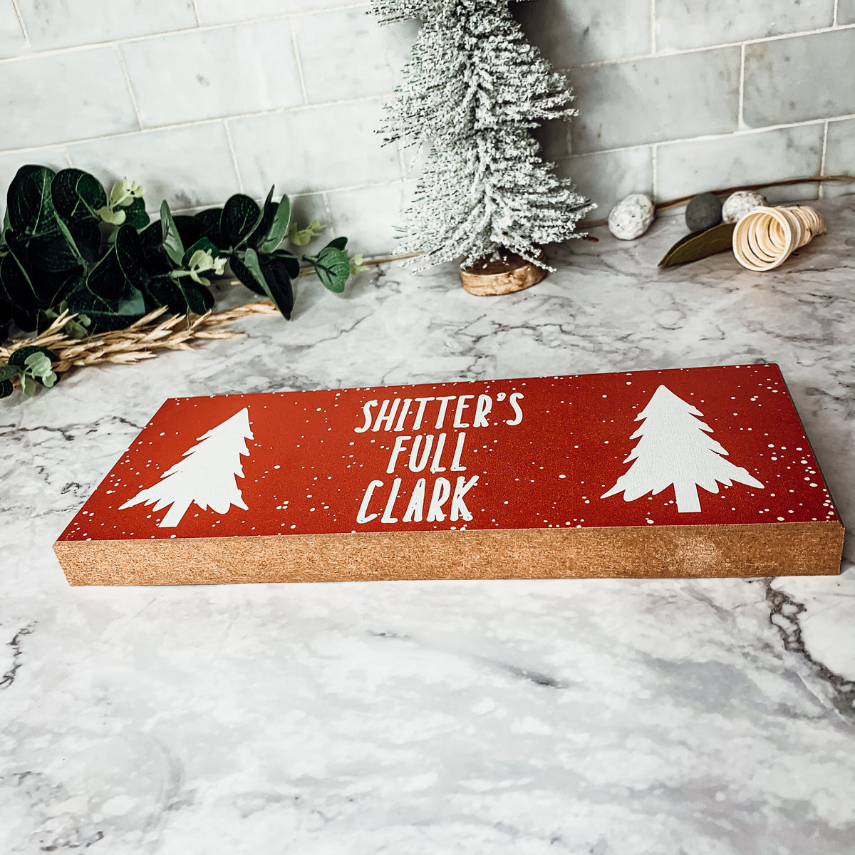 Handmade Clark Sign made of thick wood, featuring a funny Christmas design, perfect for holiday decor.