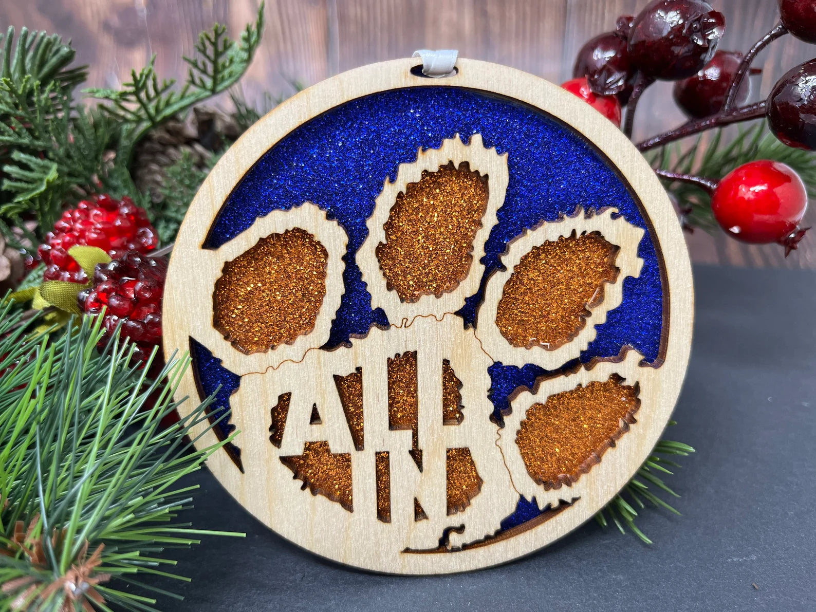 Handmade Clemson 'All In' ornament made from birch wood, measuring 4x4 inches, elegantly packaged in a cotton-filled box.