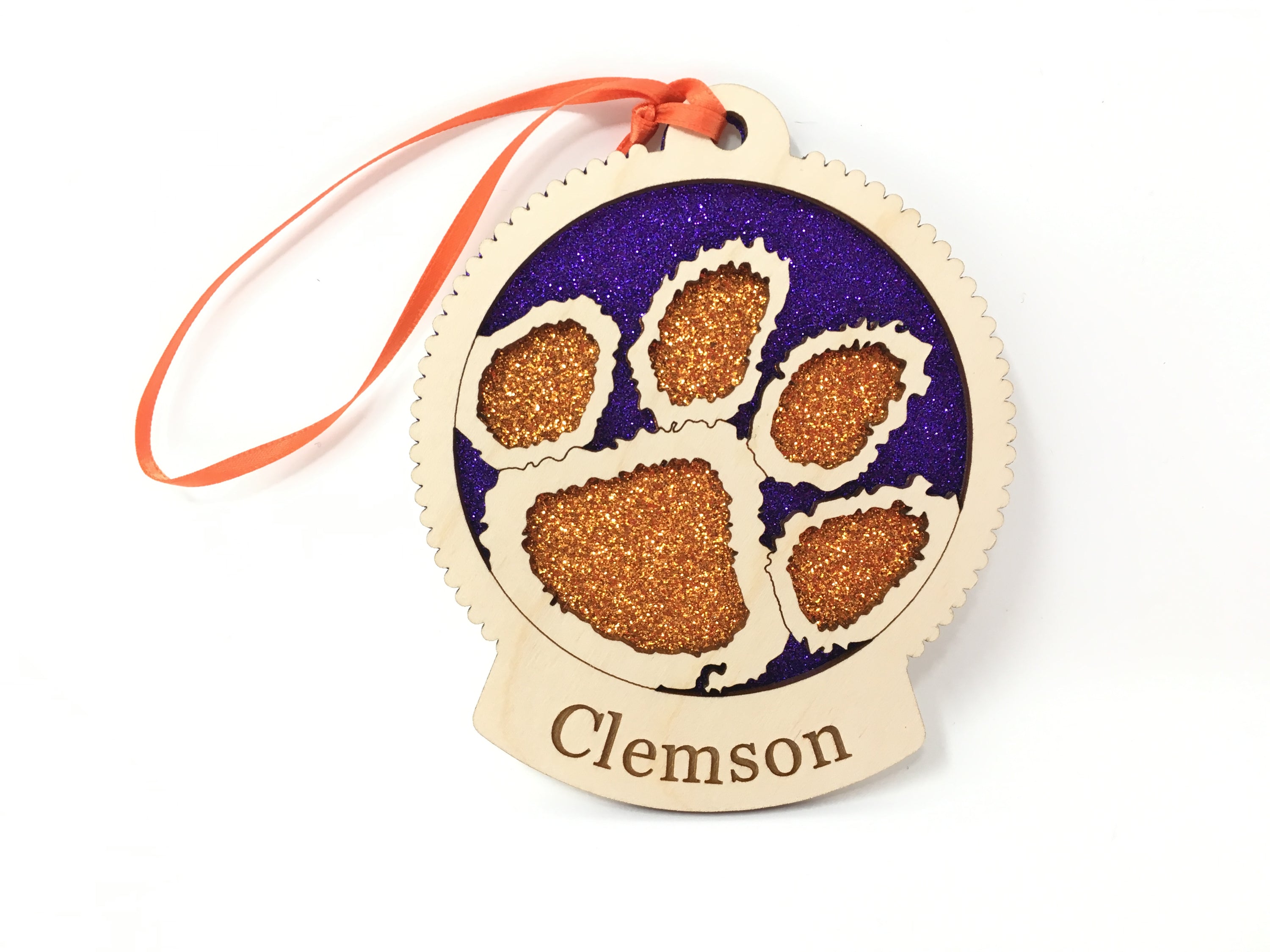 Handcrafted Clemson University ornament made of birch wood, featuring the Clemson logo, measuring 4x4 inches, packaged in a premium box.