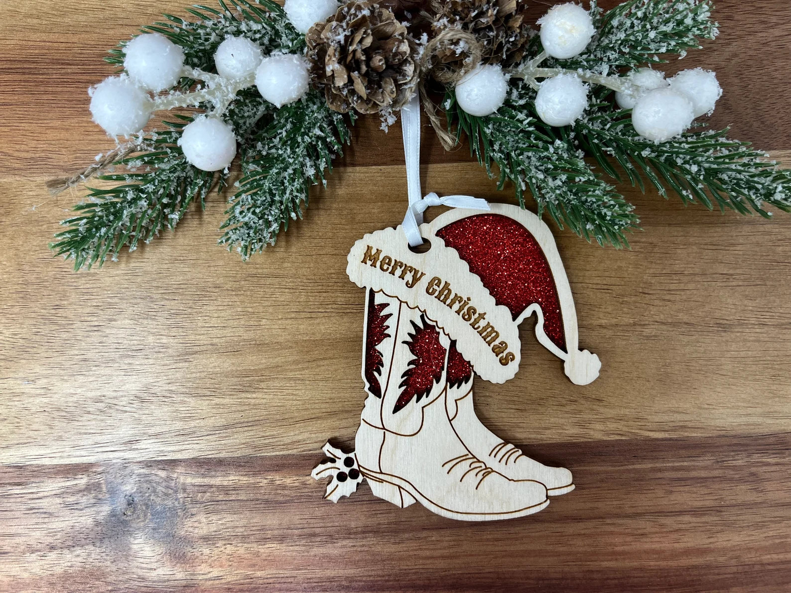 A beautifully crafted Cowboy Boots ornament made from premium Baltic Birch wood, showcasing intricate laser-cut details.