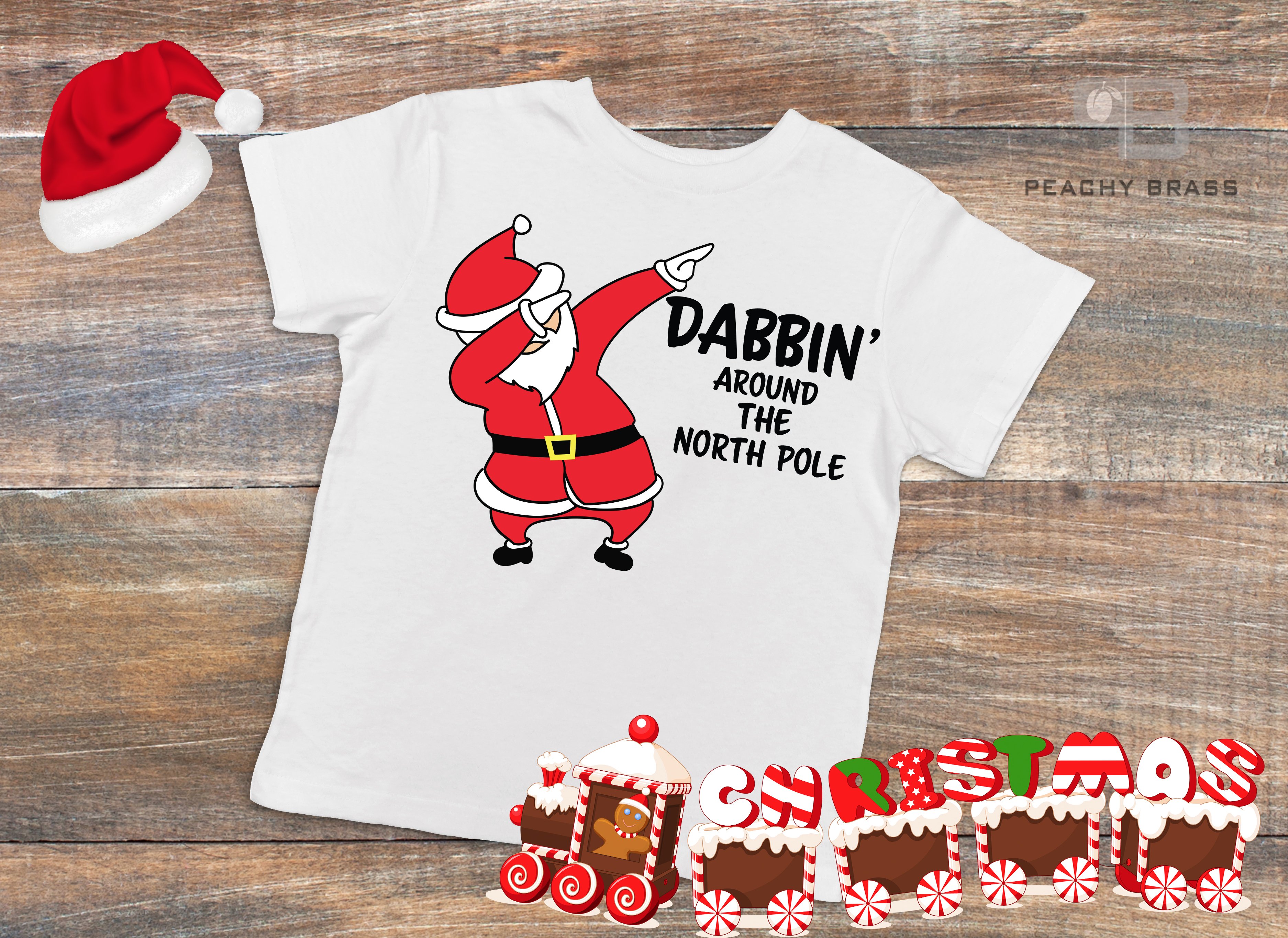 A festive Dabbin Santa Shirt featuring a playful Santa graphic, perfect for holiday celebrations and family gatherings.