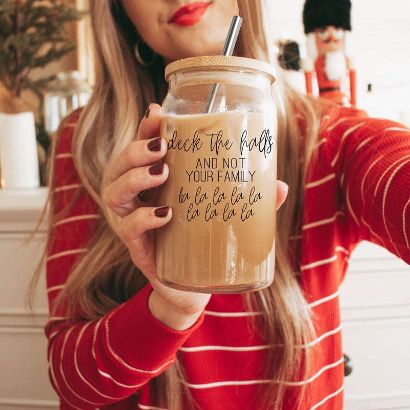 Deck the Halls Cup with bamboo lid and stainless steel straws, showcasing a modern design suitable for various beverages.